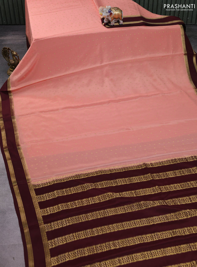 Pure mysore silk saree pastel peach with allover zari woven buttas and rettapet zari woven border