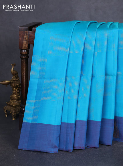 Pure soft silk saree cs blue and teal blue with allover zari weaves and temple zari woven border