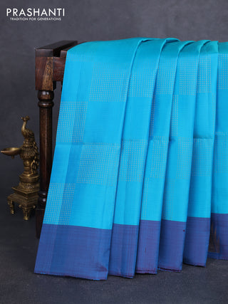 Pure soft silk saree cs blue and teal blue with allover zari weaves and temple zari woven border