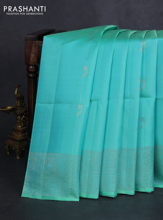 Pure soft silk saree teal green with zari woven buttas and piping border