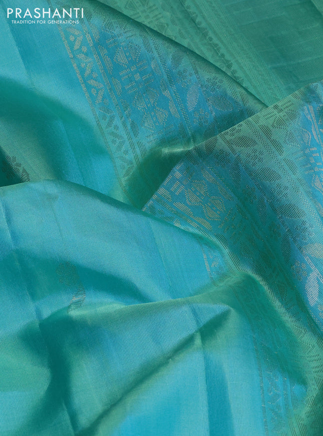 Pure soft silk saree teal green with zari woven buttas and piping border