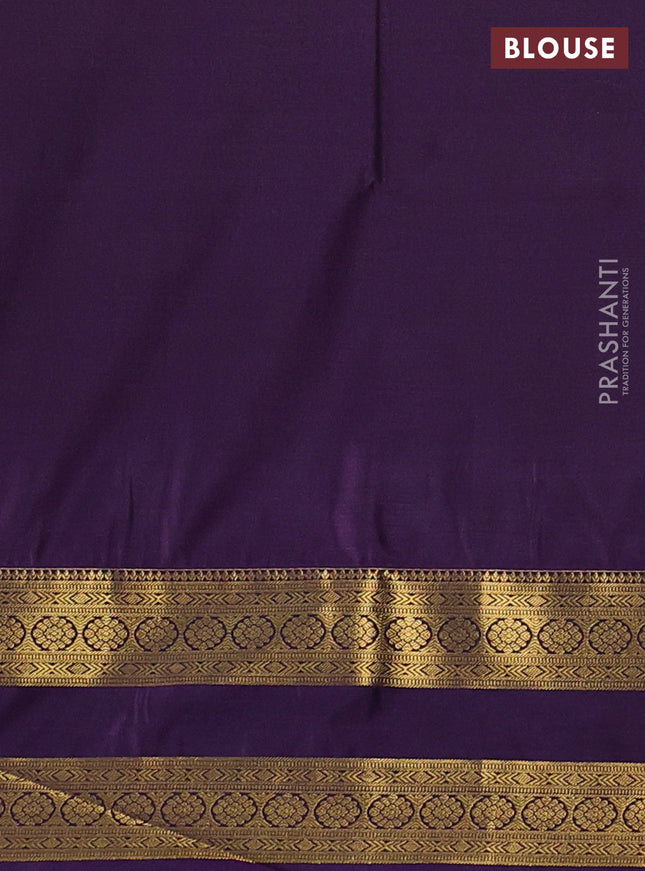 Semi soft silk saree dark mustard and purple with allover zari woven buttas and zari woven korvai border