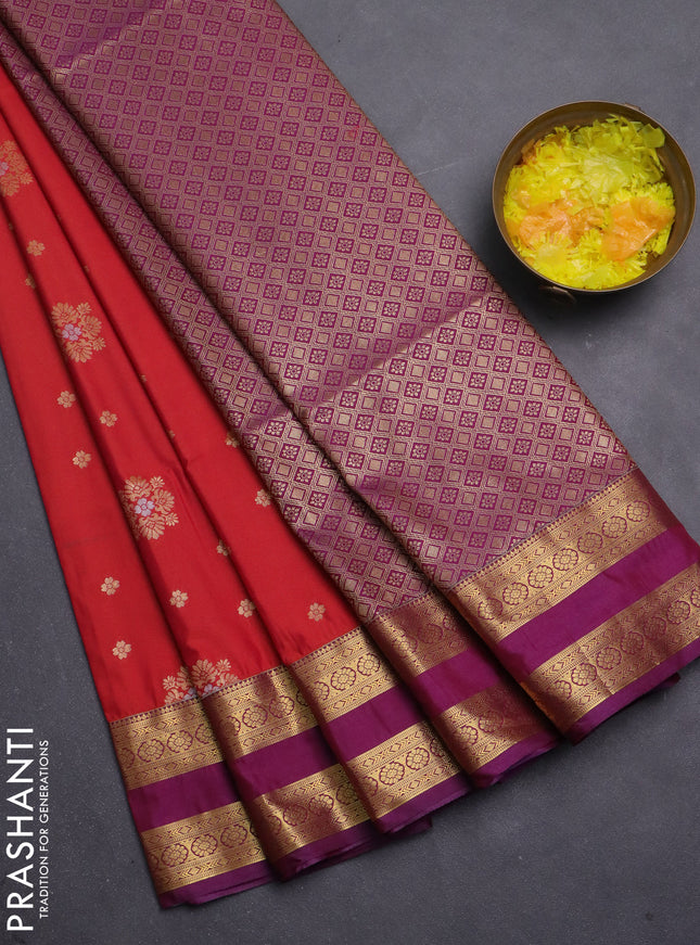 Semi soft silk saree reddish orange and purple with allover zari woven buttas and zari woven korvai border