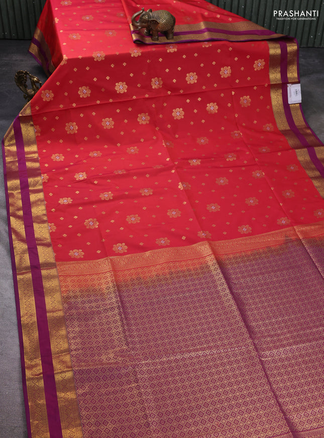 Semi soft silk saree reddish orange and purple with allover zari woven buttas and zari woven korvai border
