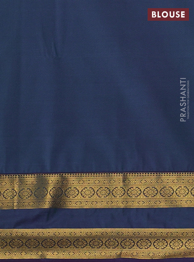Semi soft silk saree teal green and purple with allover zari woven buttas and zari woven korvai border