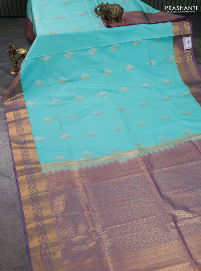 Semi soft silk saree teal blue and pink with allover zari woven buttas and zari woven korvai border