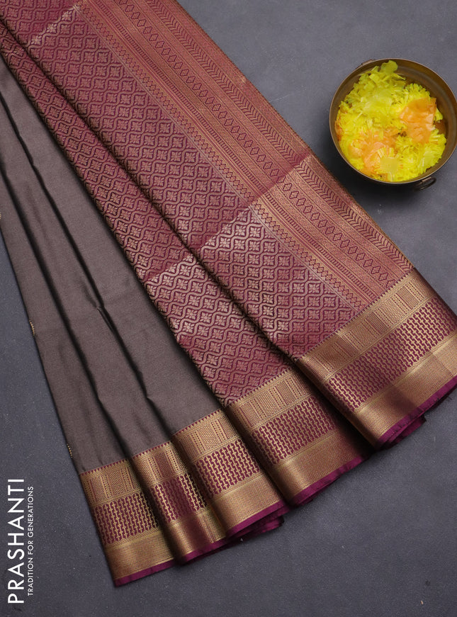 Semi soft silk saree pastel brown and magenta pink with allover zari woven buttas and zari woven korvai border