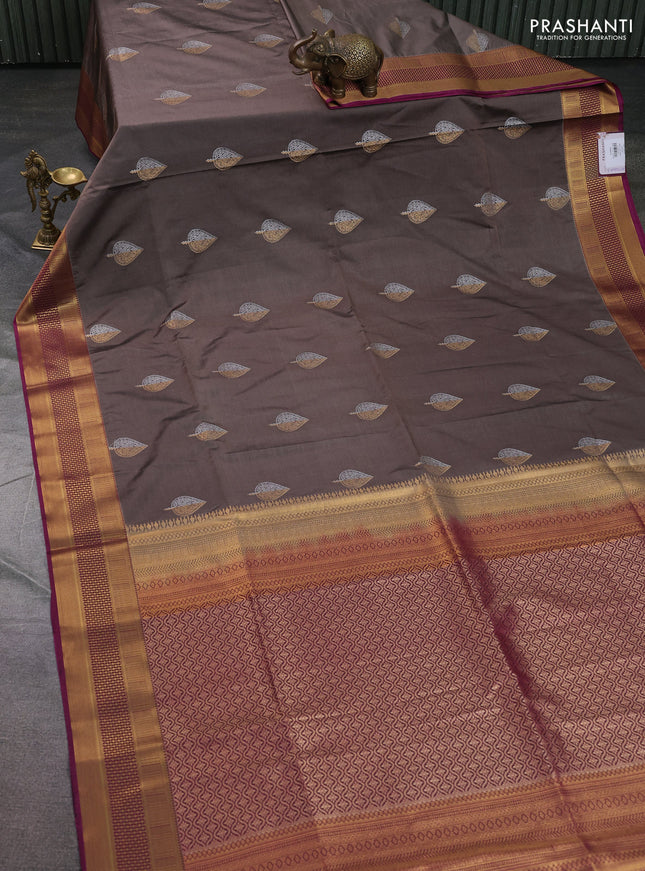 Semi soft silk saree pastel brown and magenta pink with allover zari woven buttas and zari woven korvai border