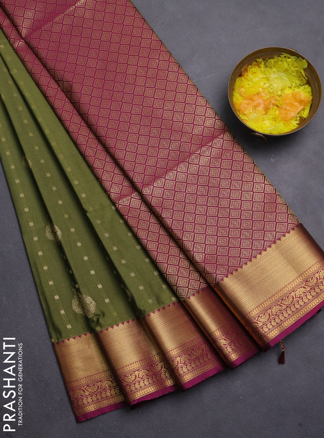 Semi soft silk saree mehendi green and magenta pink with allover zari woven buttas and zari woven korvai border