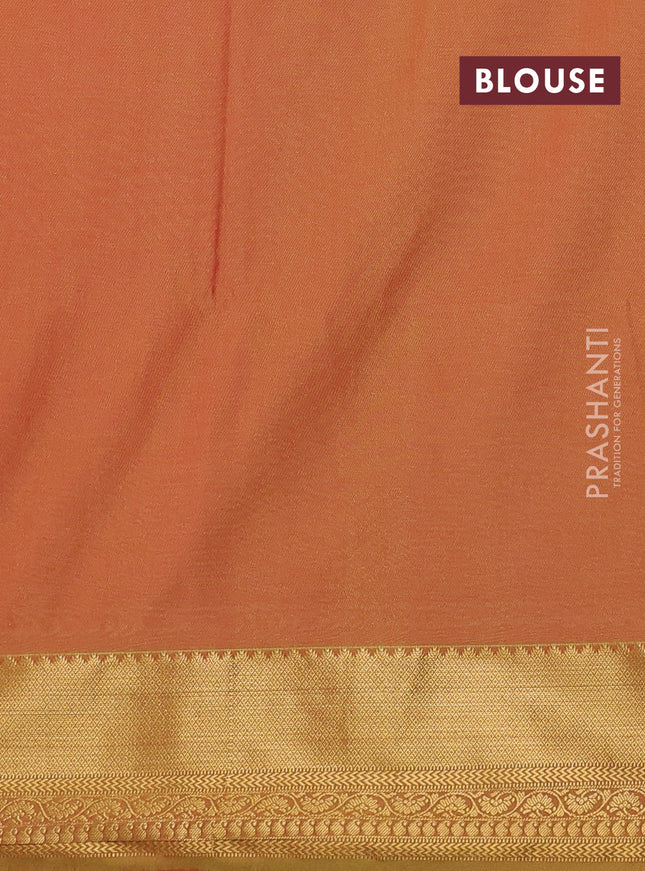 Semi soft silk saree peach shade and dark mustard with allover zari woven buttas and zari woven korvai border