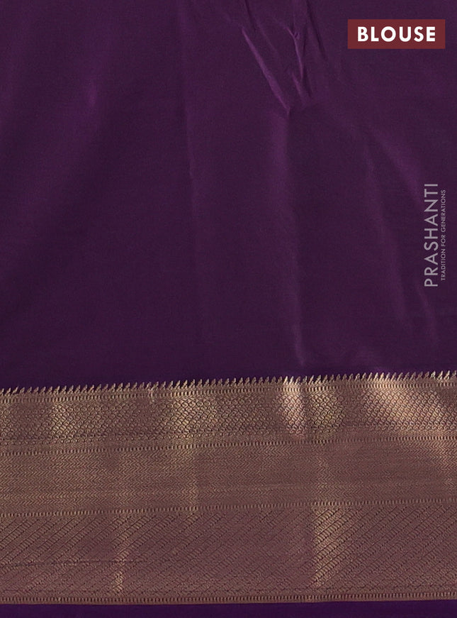 Semi soft silk saree teal green and purple with allover zari woven buttas and zari woven korvai border