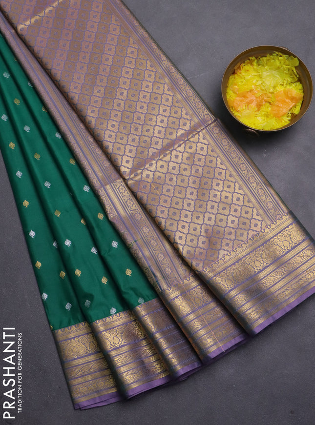Semi soft silk saree green and dual shade of pink with allover zari woven buttas and zari woven korvai border