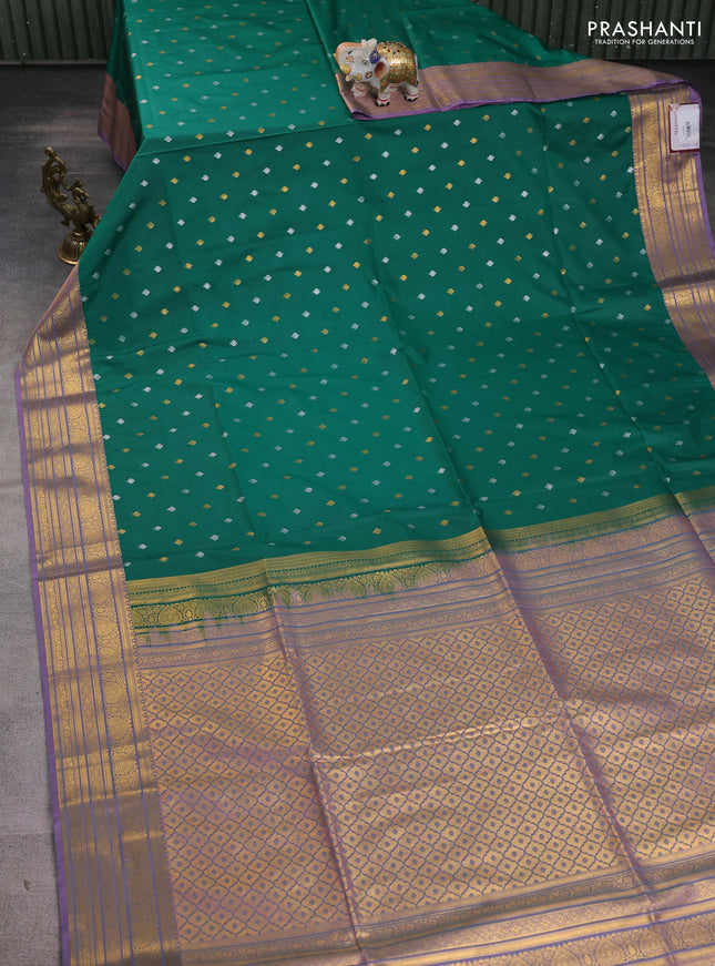 Semi soft silk saree green and dual shade of pink with allover zari woven buttas and zari woven korvai border
