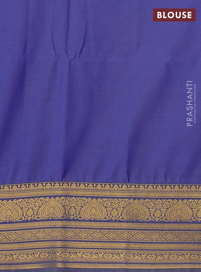 Semi soft silk saree blue and pastel green with allover zari woven buttas and zari woven korvai border