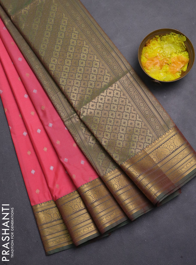 Semi soft silk saree peach pink and green with allover zari woven buttas and zari woven korvai border