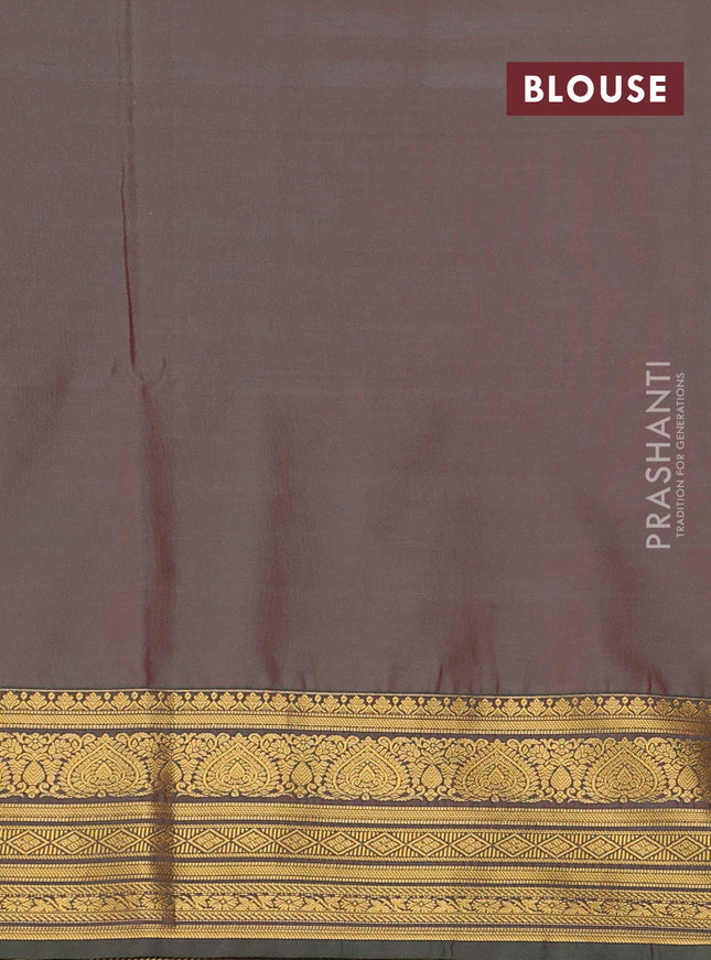 Semi soft silk saree peach pink and green with allover zari woven buttas and zari woven korvai border