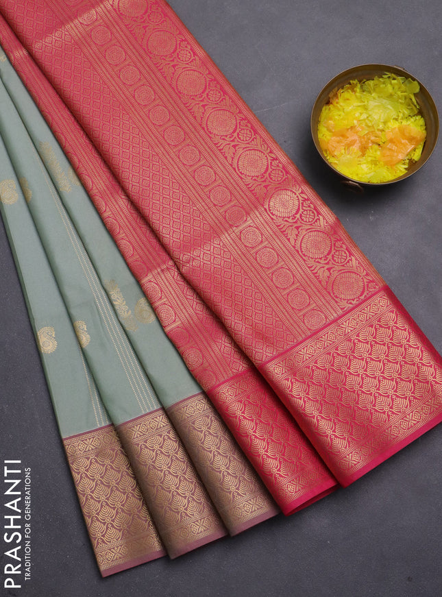 Semi soft silk saree pastel green and pink with allover zari weaves & buttas and zari woven korvai border