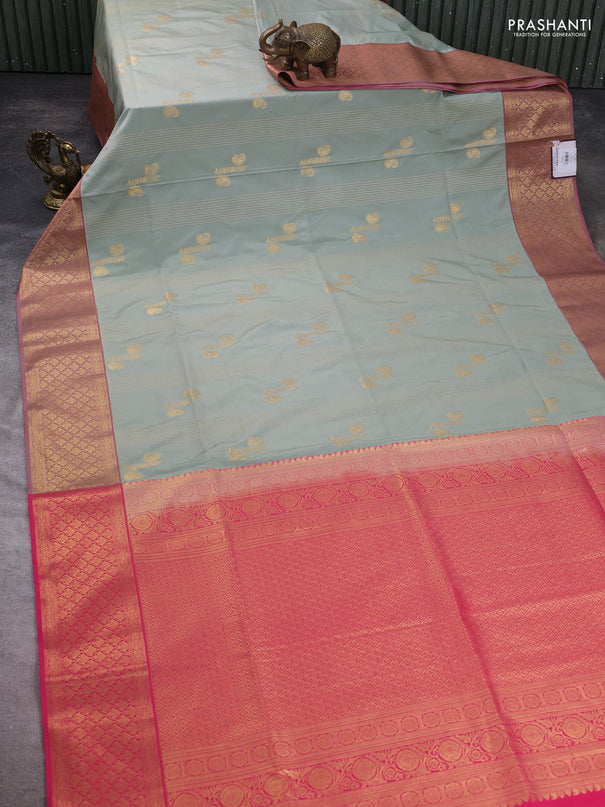 Semi soft silk saree pastel green and pink with allover zari weaves & buttas and zari woven korvai border