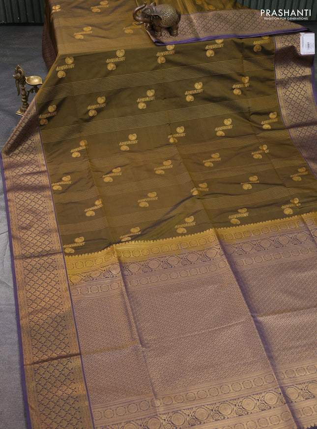 Semi soft silk saree mehendi green and pastel purple with allover zari weaves & buttas and zari woven korvai border