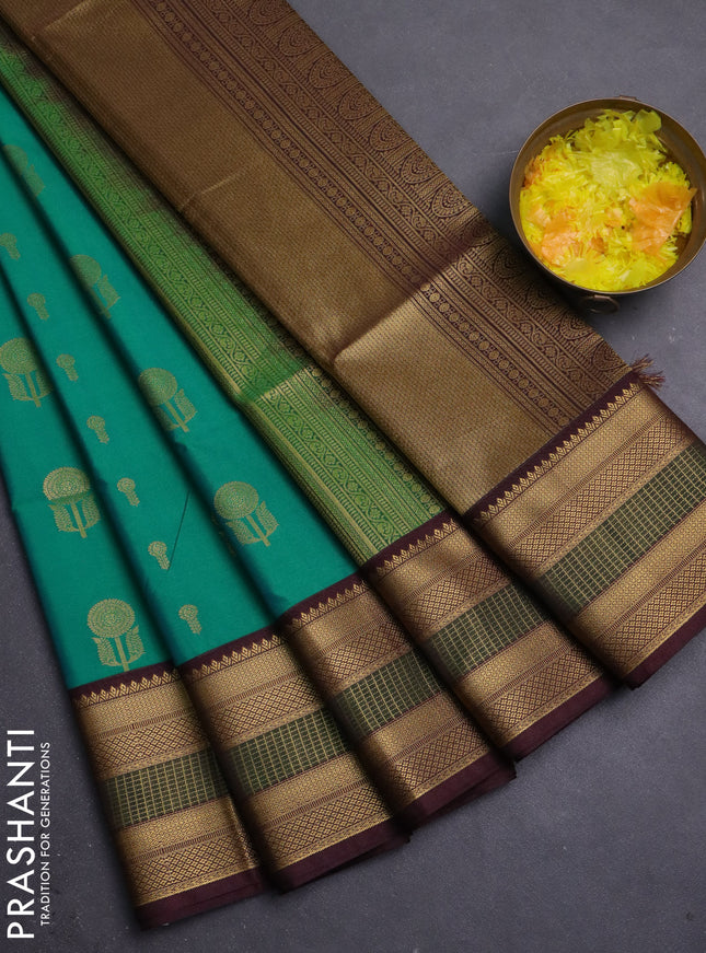 Semi soft silk saree green and coffee brown with allover zari woven buttas and zari woven border