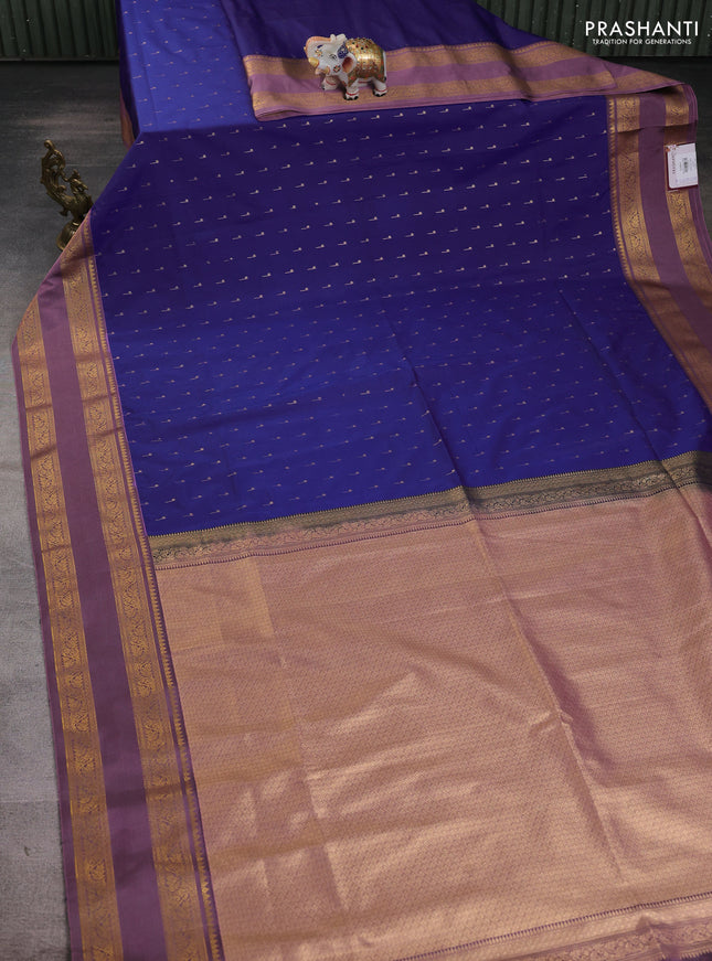 Semi soft silk saree blue and rosy brown with allover zari woven buttas and rettapet zari woven border