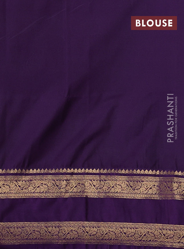 Semi soft silk saree rustic orange and purple with allover zari woven buttas and rettapet zari woven border