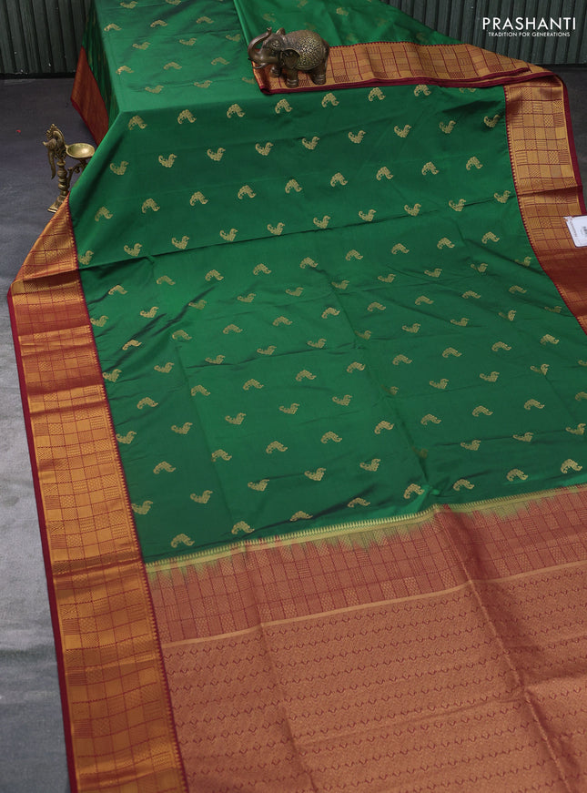Semi soft silk saree green and deep maroon with annam zari woven buttas and zari woven border