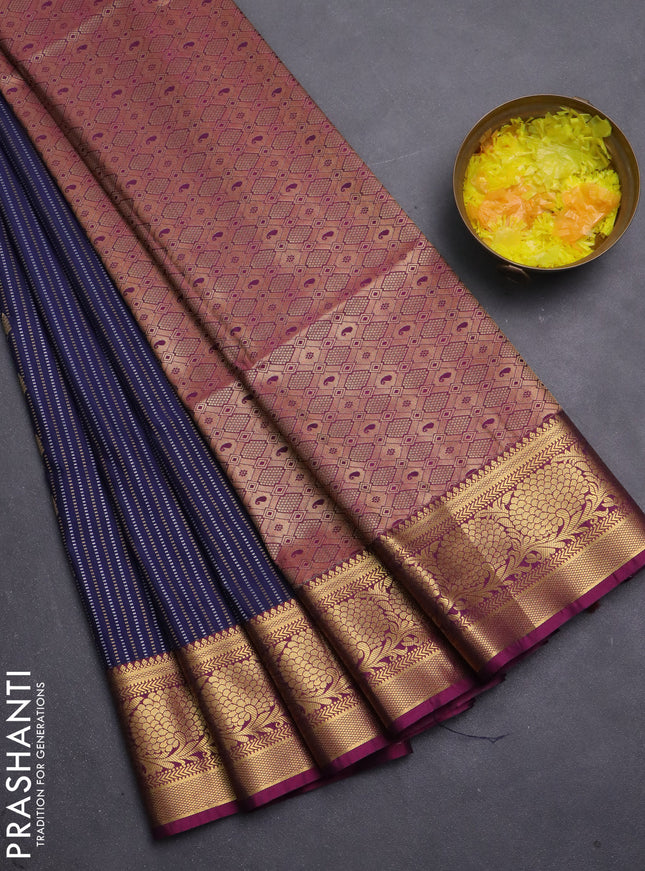Semi soft silk saree navy blue and dark magenta pink with allover zari weaves & buttas and zari woven korvai border