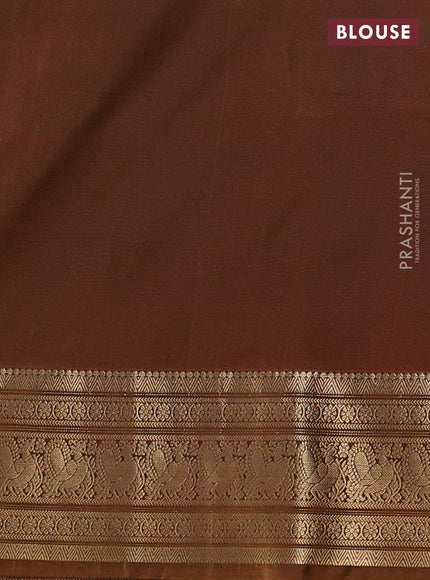 Semi soft silk saree peacock green and dark mustard with zari woven buttas and zari woven border