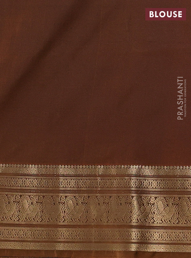 Semi soft silk saree peacock green and dark mustard with zari woven buttas and zari woven border