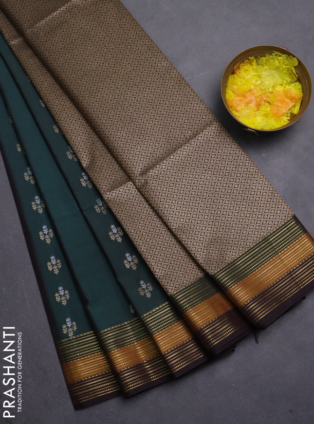 Semi soft silk saree bottle green and coffee brown with allover zari woven buttas and zari woven korvai border