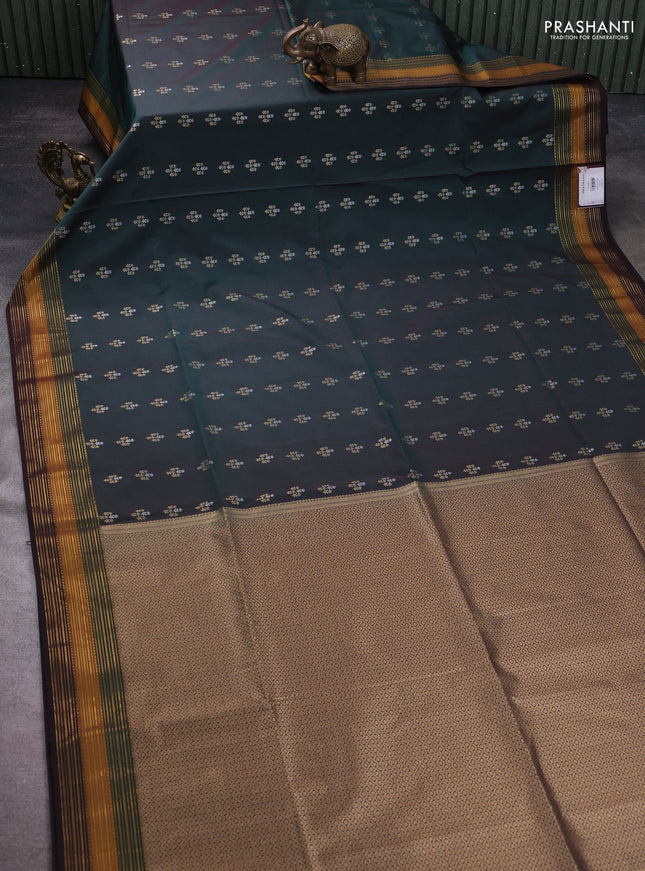 Semi soft silk saree bottle green and coffee brown with allover zari woven buttas and zari woven korvai border