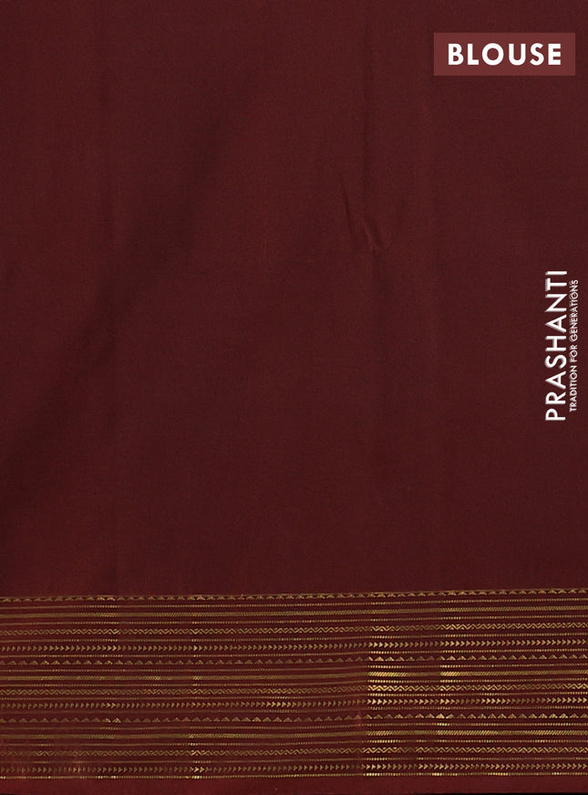 Semi soft silk saree grey and rust shade with allover zari woven buttas and zari woven korvai border