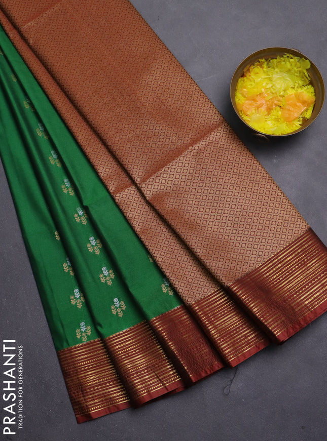Semi soft silk saree green and rust shade with allover zari woven buttas and zari woven korvai border