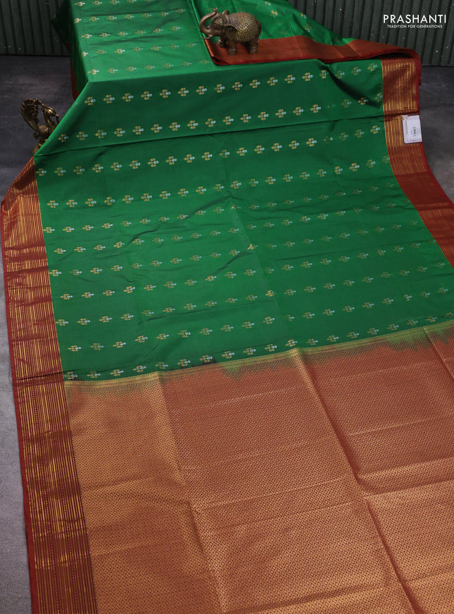 Semi soft silk saree green and rust shade with allover zari woven buttas and zari woven korvai border