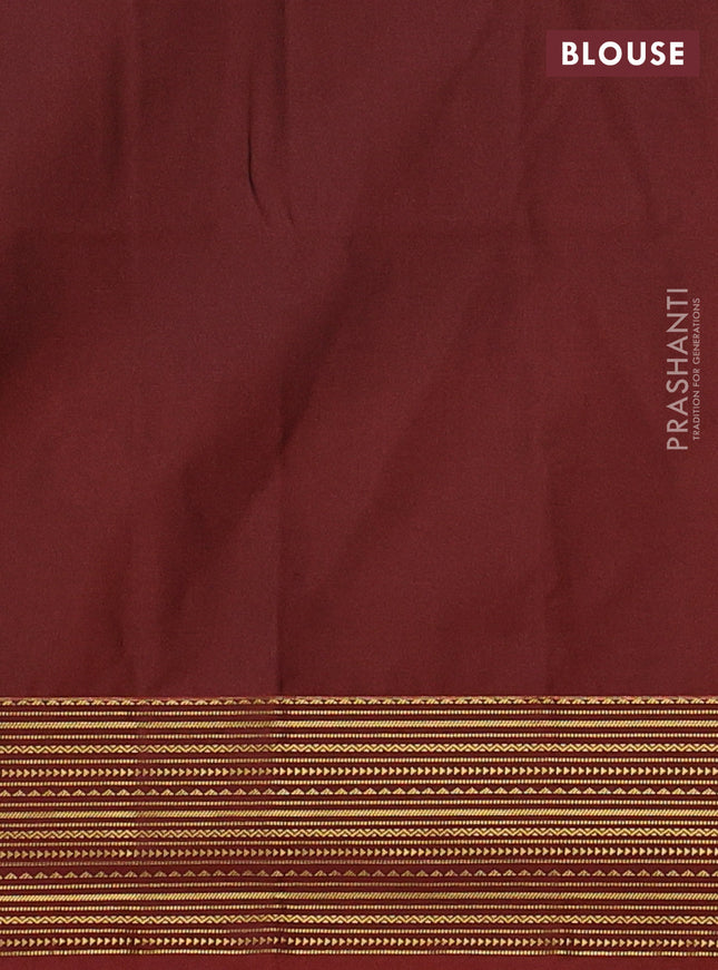 Semi soft silk saree sap green and rust shade with allover zari woven buttas and zari woven korvai border