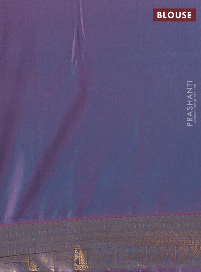 Semi soft silk saree teal green and peach shade with allover zari woven buttas and zari woven korvai border