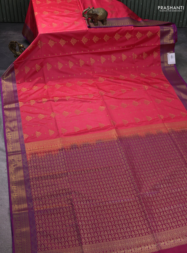 Semi soft silk saree peach shade and blue with allover zari woven buttas and zari woven korvai border