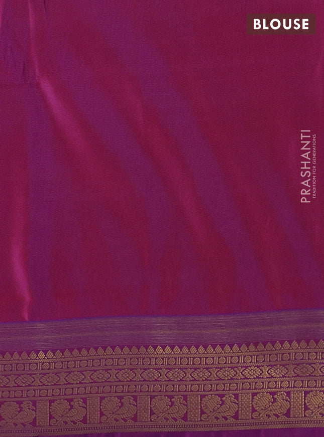 Semi soft silk saree peach shade and blue with allover zari woven buttas and zari woven korvai border