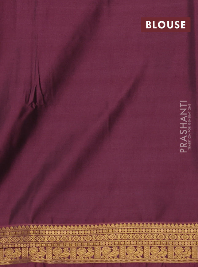 Semi soft silk saree black and peach pink with allover zari woven buttas and zari woven korvai border