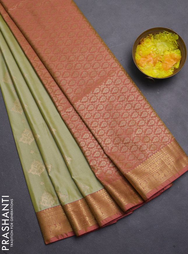 Semi soft silk saree pista green and pink with allover zari woven buttas and zari woven korvai border