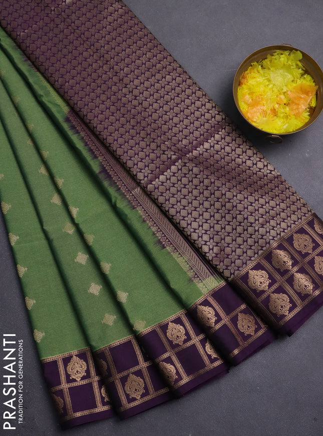 Semi soft silk saree sap green and purple with allover zari woven buttas and zari woven border