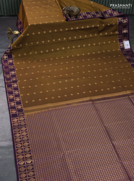 Semi soft silk saree dark mehendi green and purple with allover zari woven buttas and zari woven border