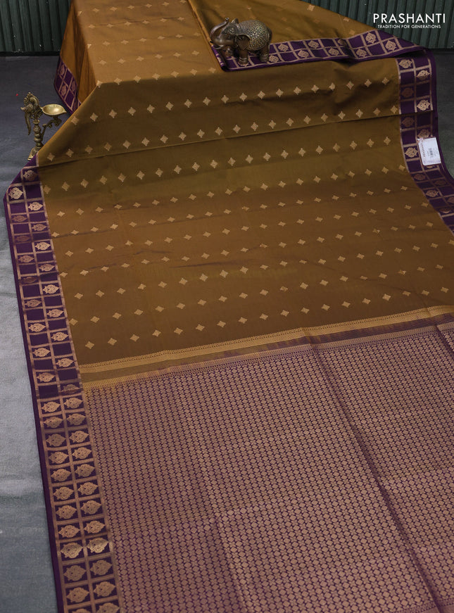 Semi soft silk saree dark mehendi green and purple with allover zari woven buttas and zari woven border