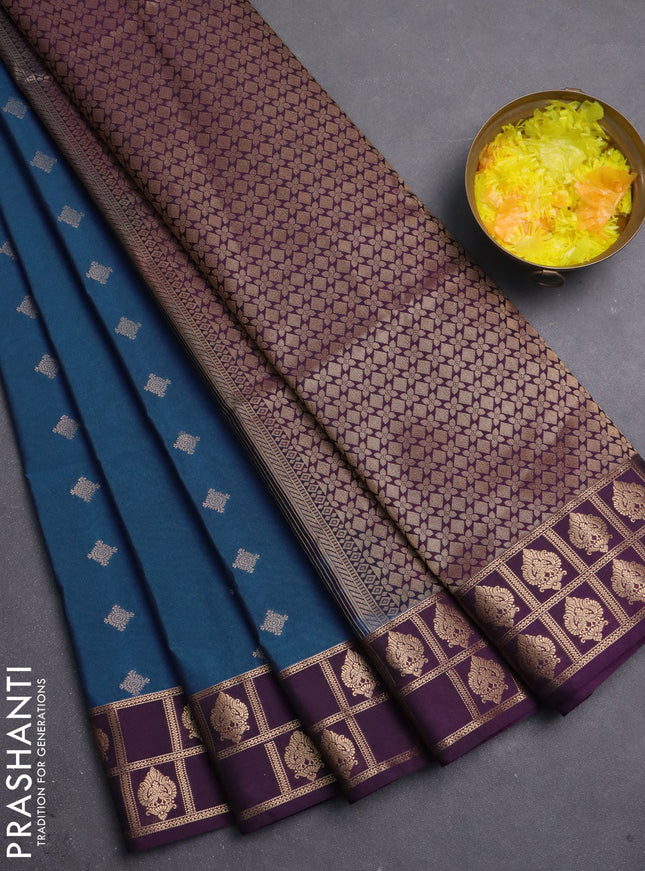 Semi soft silk saree peacock blue and deep purple with allover zari woven buttas and rettapet zari woven border