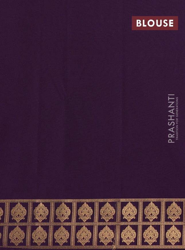 Semi soft silk saree rust shade and purple with allover zari woven buttas and rettapet zari woven border