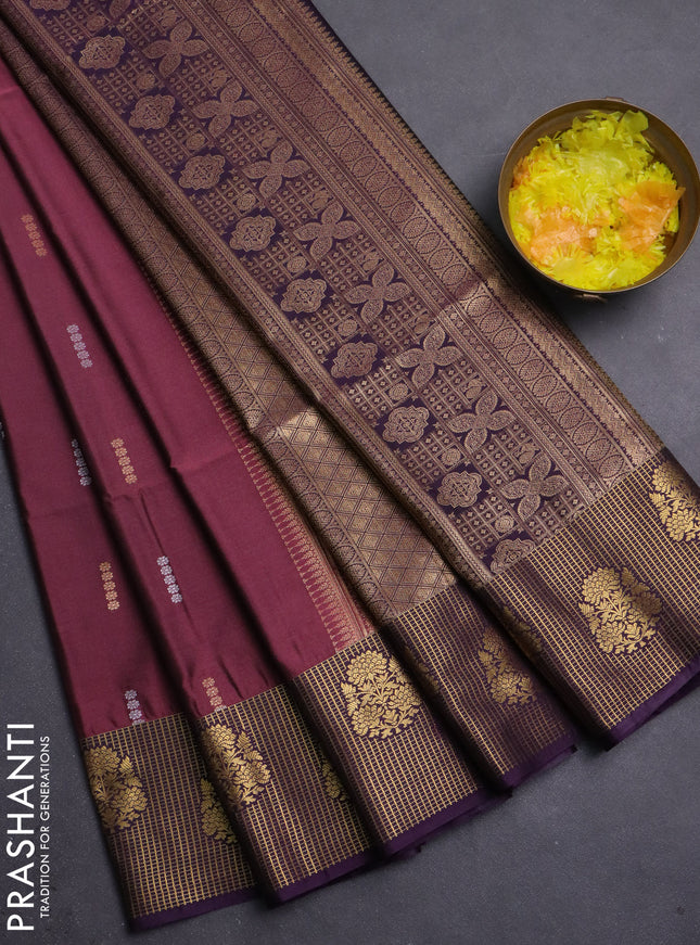 Semi soft silk saree wine shade and purple with allover zari woven buttas and zari woven border
