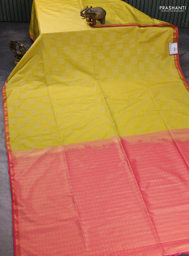 Semi soft silk saree yellow and peach pink with allover silver & gold zari woven buttas and small zari woven border