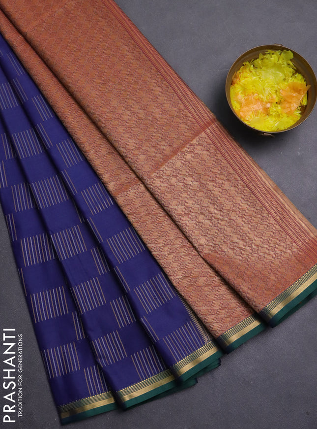 Semi soft silk saree navy blue and dual shade of rust with allover zari woven buttas and zari woven border