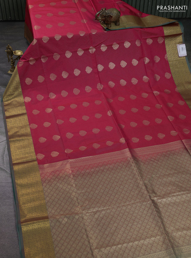 Semi soft silk saree tomato pink and teal green with allover zari weaves & buttas and zari woven border